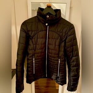 Spider jacket. Jacket or mid layer. Polyester and Interior is down.